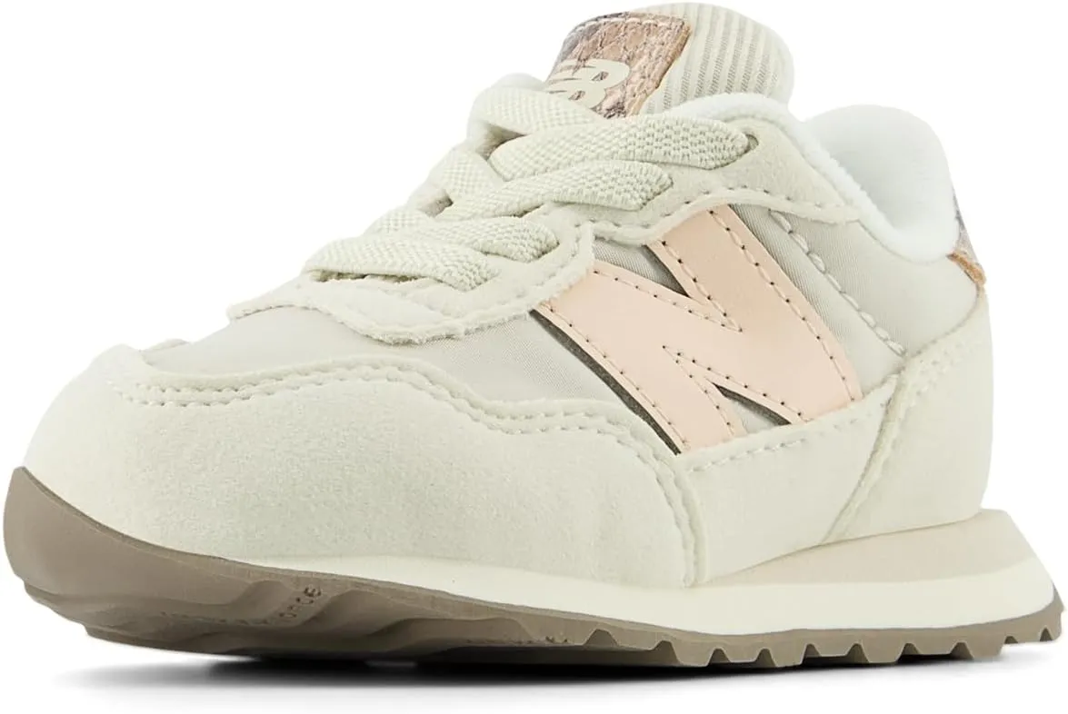 New Balance Kids 237 Bungee Sneaker, TURTLEDOVE/VINTAGE ROSE, 3 M Infant (0-12 Months)